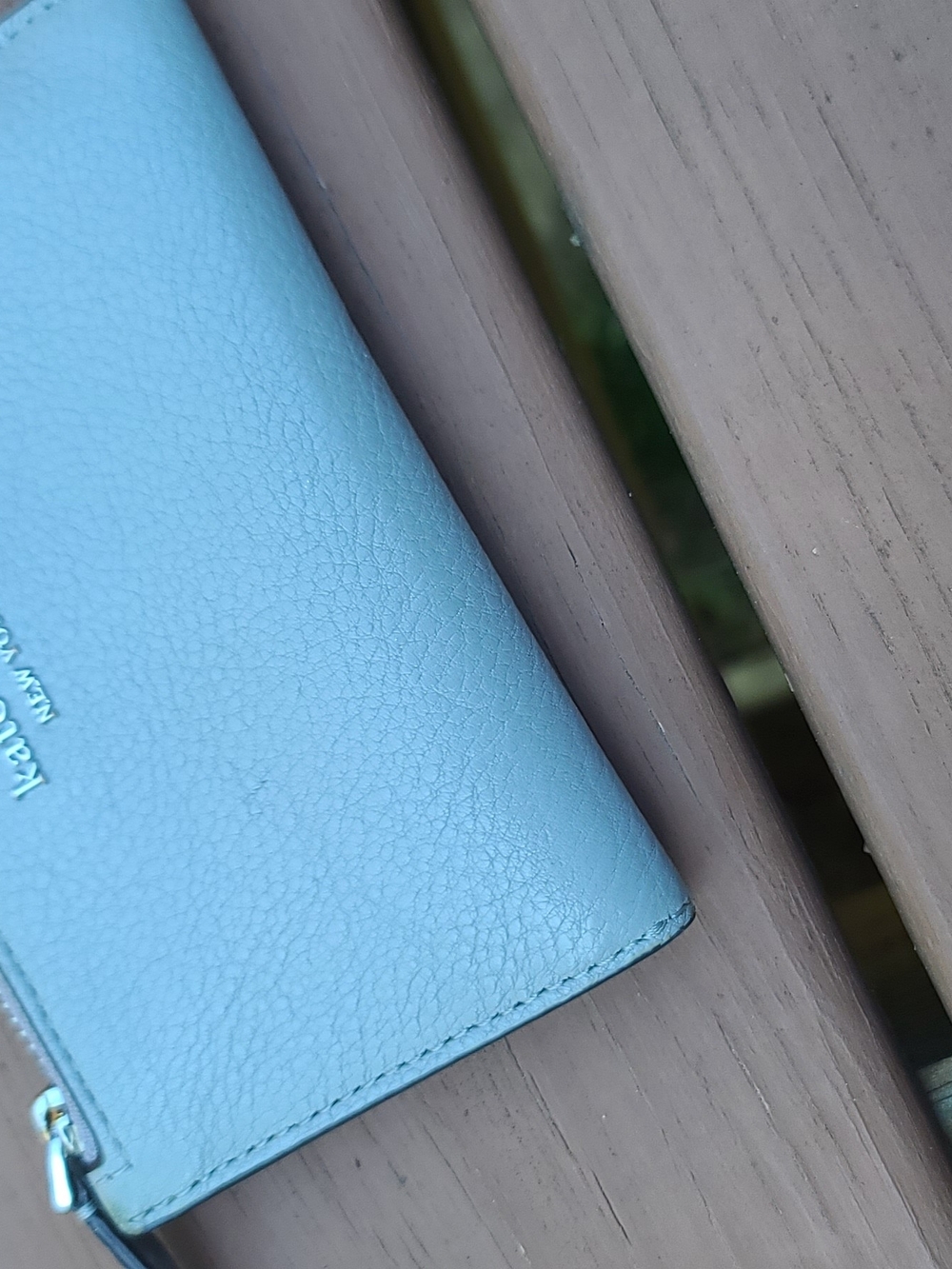 kate spade pebbled leather wristlet in light blue
